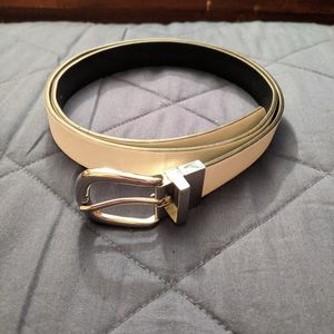 Reversible black and white belt.